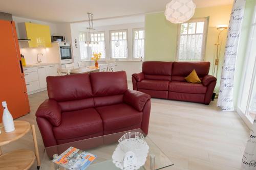 Ferienhaus 'Regenbogen' F401 mit Kamin, Terrasse, Garten
