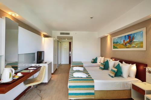 Sunis Evren Beach Resort Hotel & Spa Sunis Evren Beach Resort Hotel & Spa is a popular choice amongst travelers in Side, whether exploring or just passing through. The property features a wide range of facilities to make your stay a plea