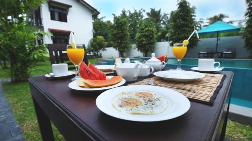 Restaurant, Kaminrich Cottage in Matara