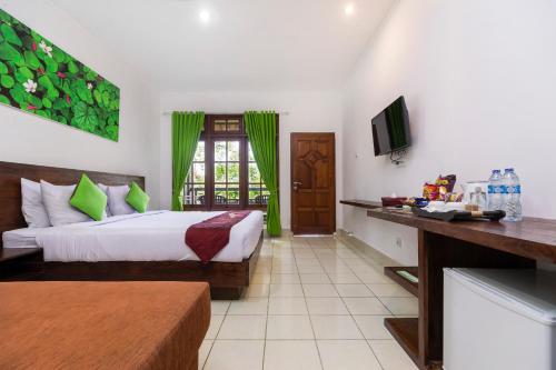 Bali Wirasana Inn - Tap to explore photos