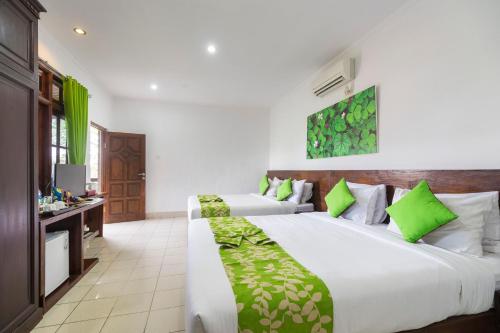 Bali Wirasana Inn Room Type - Family Room with Balcony