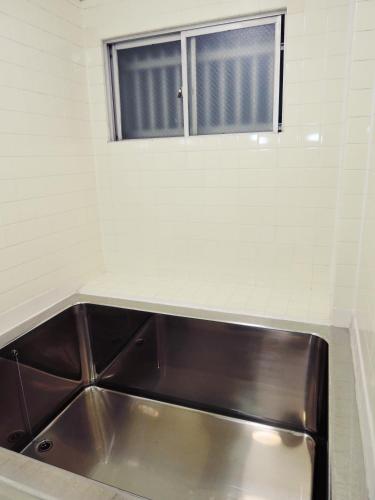 Fürdőszoba, Hotel Lucky in Oszaka déli része