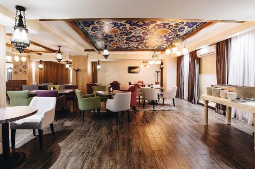 餐廳, 瑞尼恩公園酒店 (Renion Park Hotel) in 麥迪奧區