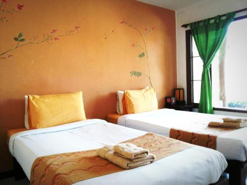 บ้านไม้คนเมือง Baan Mai Kon Muang Pai Resort