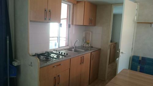  Family friendly apartments with a swimming pool Novalja, Pag - 13090 in Novalja