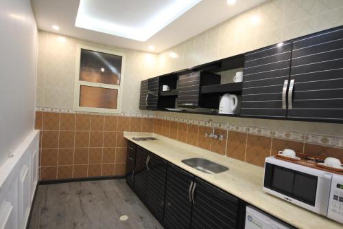 Konyha, Dora Darin Apartments Open Hotel in Al Bukayriyah