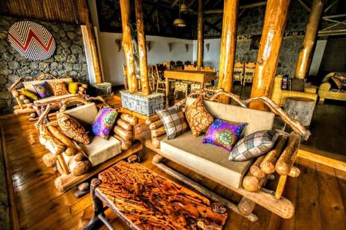 ห้องส่วนกลางสำหรับนั่งเล่น/ดูทีวี, Kivu Paradis Resort in รูเฮนเกรี