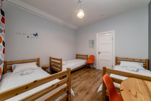 Orange Cat Rooms Room Type - Triple Room with Shared Bathroom