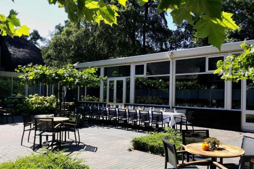 ระเบียง/ชานเรือน, Landgoedhotel Woodbrooke Barchem in เฟอร์สไพรเดอ เฮาเชน โลเคมเซเวค