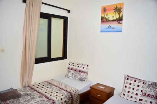 Two-Bedroom Apartment room in Kakatar Family Residence  Yoff