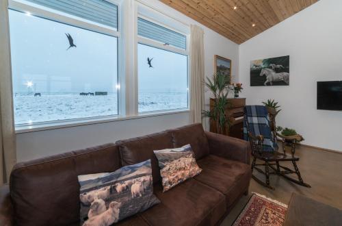 Koplietošanas atpūtas telpa ar TV, Alftroð Guesthouse in Fjall