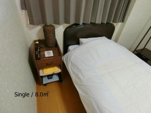 Small Single Room with Private Bathroom - Non-Smoking