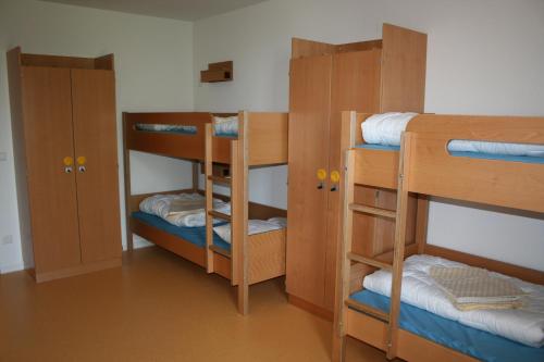 Single Bed in Male Dormitory Room