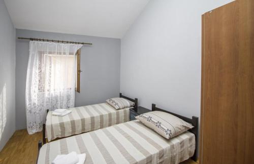 Two-Bedroom Apartment with Balcony room in Apartments with a parking space Zadar - 14685