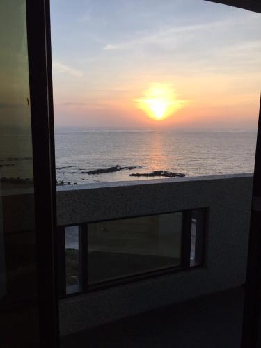 Beach, De Mei Homestay in Qimei Township