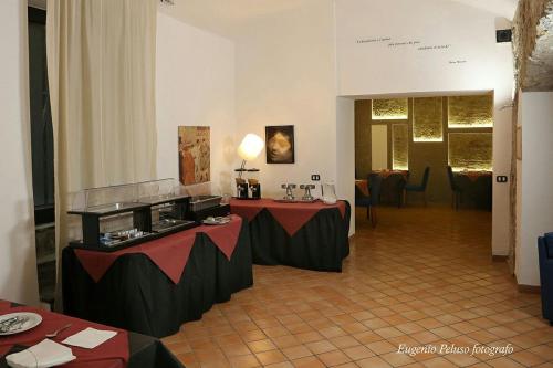 Caravaggio Hotel near Straße San Gregorio Armeno