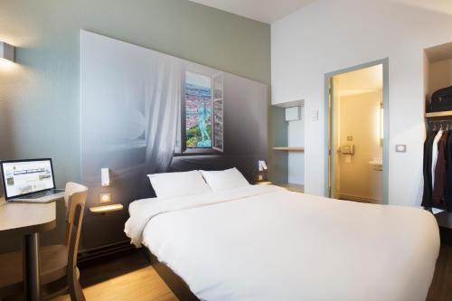 B&B Hotel Lyon St Priest B&B Hôtel Lyon St Priest is conveniently located in the popular Saint-Priest area. The property offers a high standard of service and amenities to suit the individual needs of all travelers. Service-