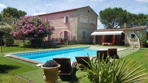 ACCENT IMMOBILIER - Mas de l'Olive, piscine chauffée, 8 pers gîte à louer Rognonas