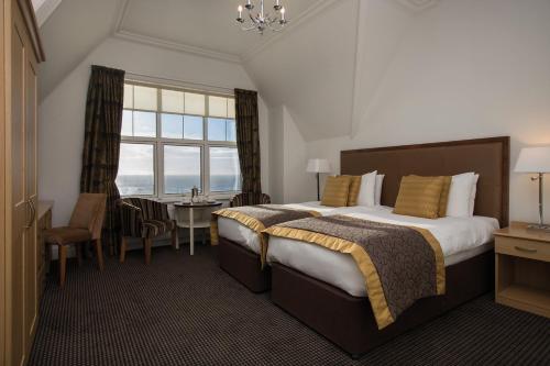 Twin Room with a Side Sea View