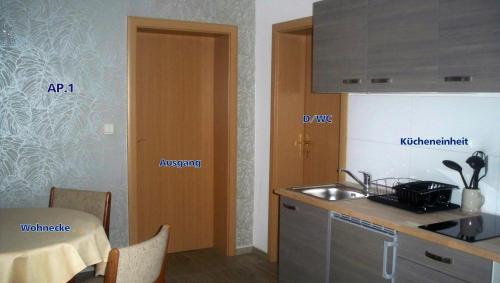 廚房, Ferienappartements Am Weinberg in 貝斯滕塞