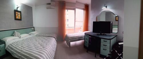 Quadruple Room with Balcony