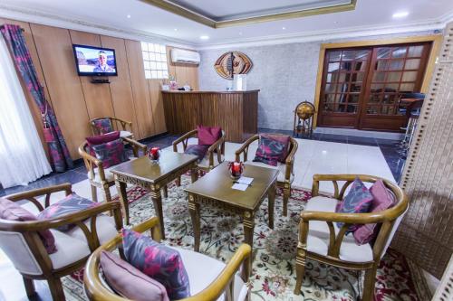 sala de TV, Residence Hoteliere Le Jomonia in Libreville