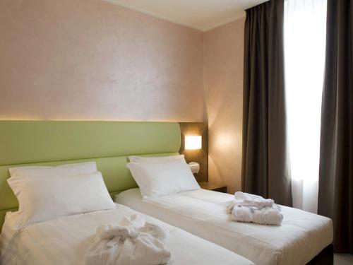 Base Hotel Base Hotel To Work is a popular choice amongst travelers in Noventa Di Piave, whether exploring or just passing through. The hotel offers a high standard of service and amenities to suit the individua