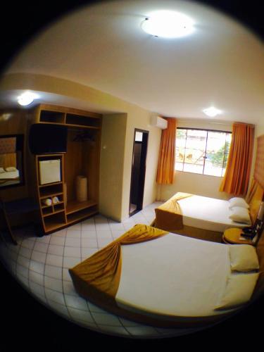 King Konfort Hotel The 4-star King Konfort Hotel offers comfort and convenience whether youre on business or holiday in Maringa. The property offers guests a range of services and amenities designed to provide comfort 