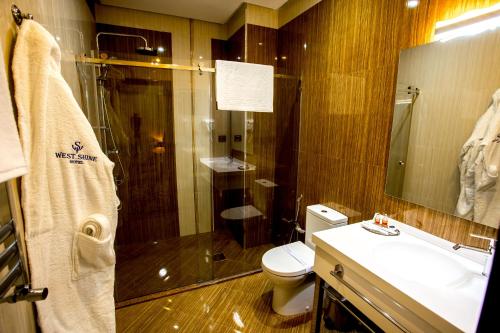 West Shine Hotel Stop at West Shine Hotel to discover the wonders of Baku. The property offers a wide range of amenities and perks to ensure you have a great time. Service-minded staff will welcome and guide you at We