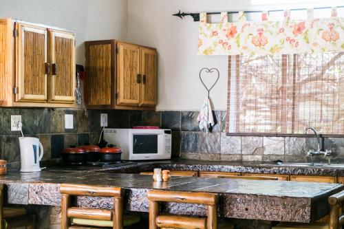 virtuve, Moholoholo Ya Mati in Hoedspruita