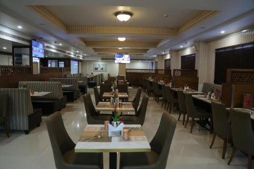 Restaurant, Hotel Grand Gayathri in Gangaram