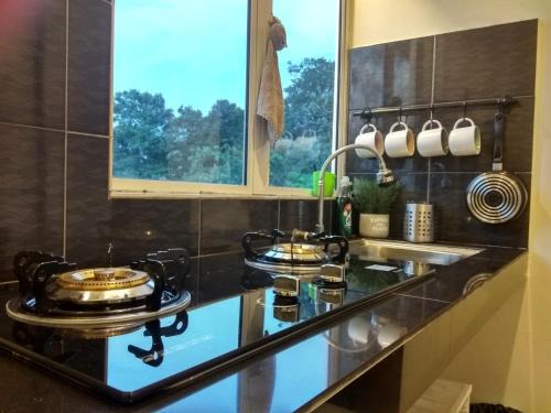 Kitchen, Tehel Farmhouse - Homestay Melaka in Bemban