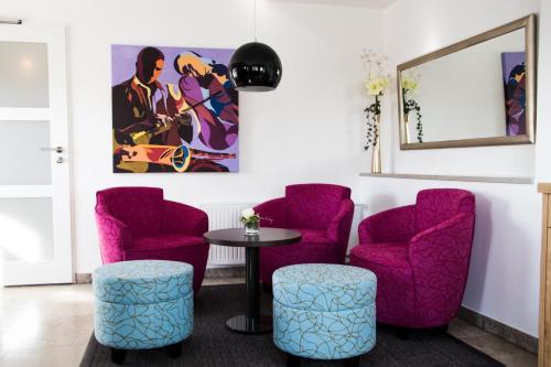 zonă comună salon/TV, Pension Engelkeller in Donauworth