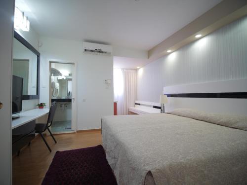 Chambre triple, 3 lits