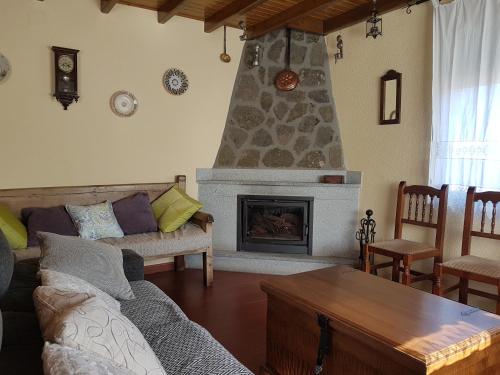 Közös társalgó / TV, Casa Rural Las Chorreras in Navalonguilla