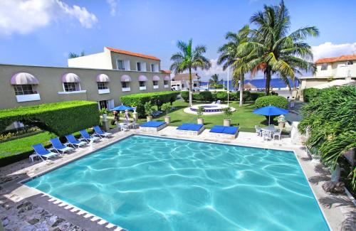 Jardín, Hotel Villablanca Garden Beach in Cozumel Waterfront