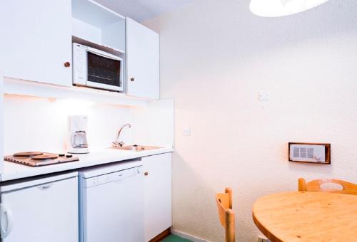 Kitchen, Residence Les Alpages - maeva Home in Avoriaz