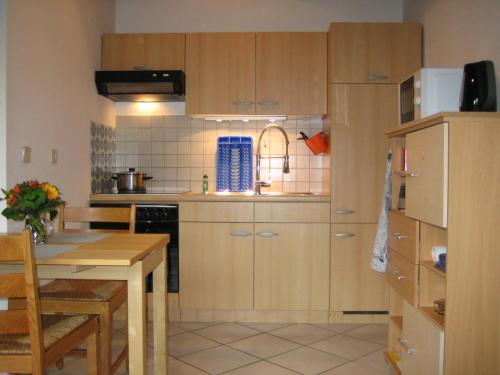 virtuve, Kleine Wohnung mit Terrasse in Dulmen