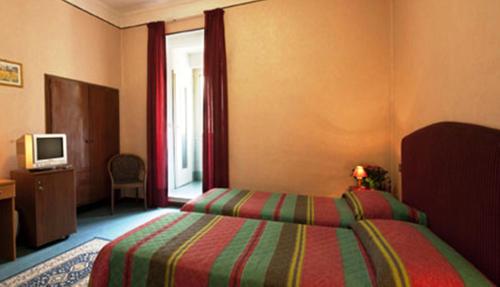 Hotel Italia - Tap to explore photos