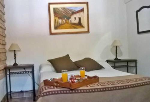 Hostal Tierra de Vinos Hostal Tierra de Vinos is perfectly located for both business and leisure guests in Cafayate-Tolombon. The property has everything you need for a comfortable stay. Service-minded staff will welcome an