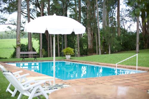 Peldbaseins, Pousada Fazenda Pinhalzinho in Ribeirao Claro