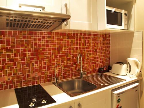 مطبخ, Albany Rosedale Motel in الشاطئ الشمالي