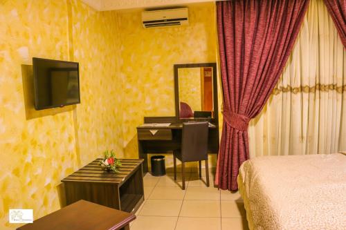 Noubou International Hotel The 3-star Noubou International Hotel offers comfort and convenience whether youre on business or holiday in Douala. The property offers guests a range of services and amenities designed to provide c