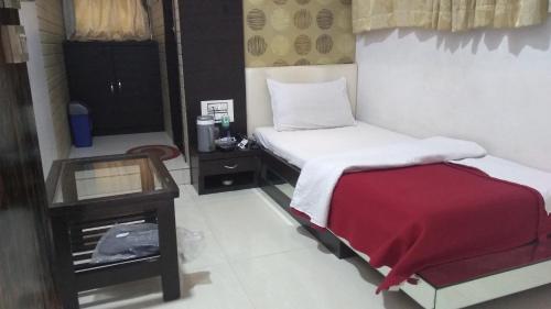 Hotel Navi Mumbai Stop at Hotel Navimumbai to discover the wonders of Mumbai. Offering a variety of facilities and services, the property provides all you need for a good nights sleep. Service-minded staff will welcom