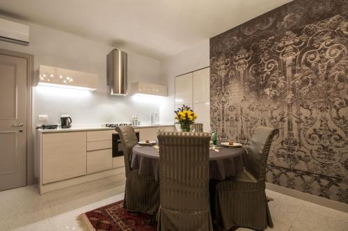 Photo 46 Muneghe- San Marco luxury apartments