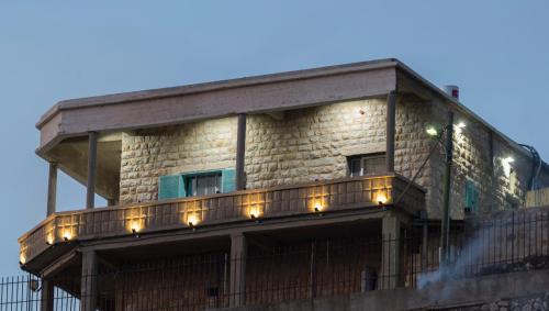 ทัศนียภาพภายนอกโรงแรม, צימר old school in มาชดัล ชามส์