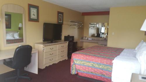 . ECONOMY INN & SUITES