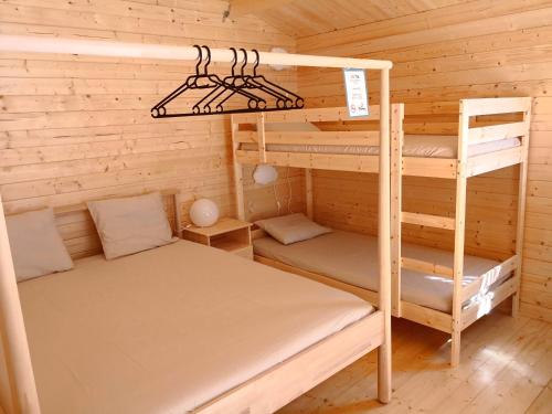 1 queen bed, 1 bunk bed