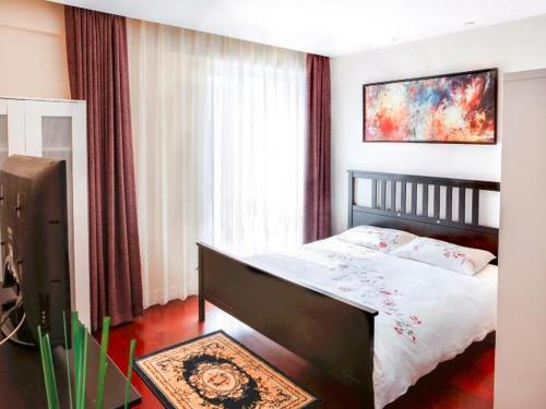 Фотография номера квартиры Yi Chao Service Apartment