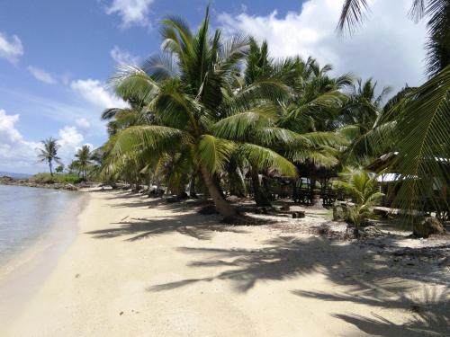 Beach, RedDoorz @ Western Highway Lodge Hotel in Marabut